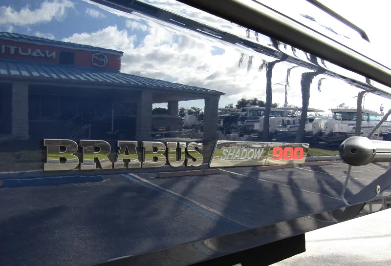 Slide: The Image of 2024 BRABUS Shadow 900 ST logo on sleek boat exterior reflecting surroundings. - 4