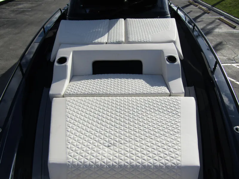 Slide: The Image of 2024 BRABUS Shadow 900 ST luxury boat with white quilted seating. - 8