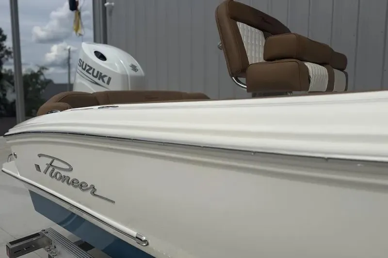 Slide: The Image of 2026 Pioneer 202 Islander boat with Suzuki engine, featuring sleek design and comfortable seating. - 4