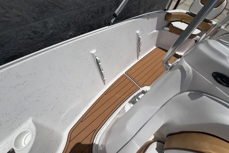 Slide: The Image of Interior view of 2024 ALK2 Powerboats 18 CRS with wood flooring. - 13