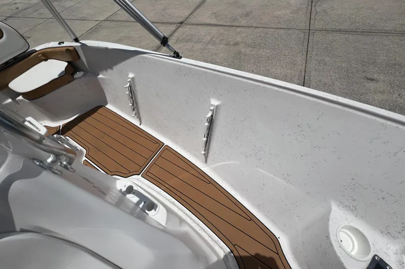 Slide: The Image of Interior of ALK2 Powerboats 18 CRS 2024 with wood flooring. - 15