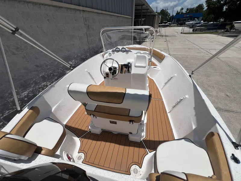 Slide: The Image of Interior view of 2024 ALK2 Powerboats 18 CRS with wood flooring. - 4