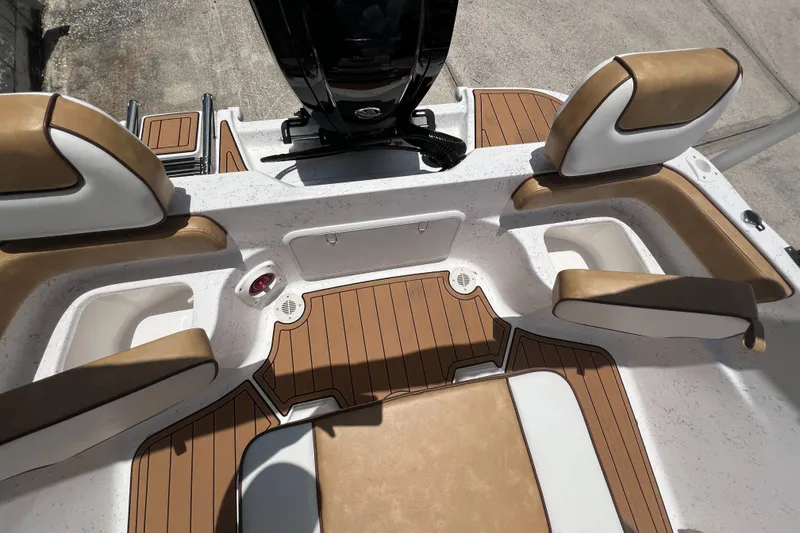 Slide: The Image of Interior of ALK2 Powerboats 18 CRS 2024 with brown seating. - 9