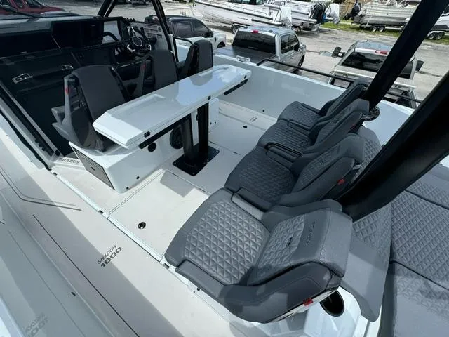 Slide: The Image of 2024 BRABUS Shadow 1000 ST boat interior with luxury seating and sleek design. - 9