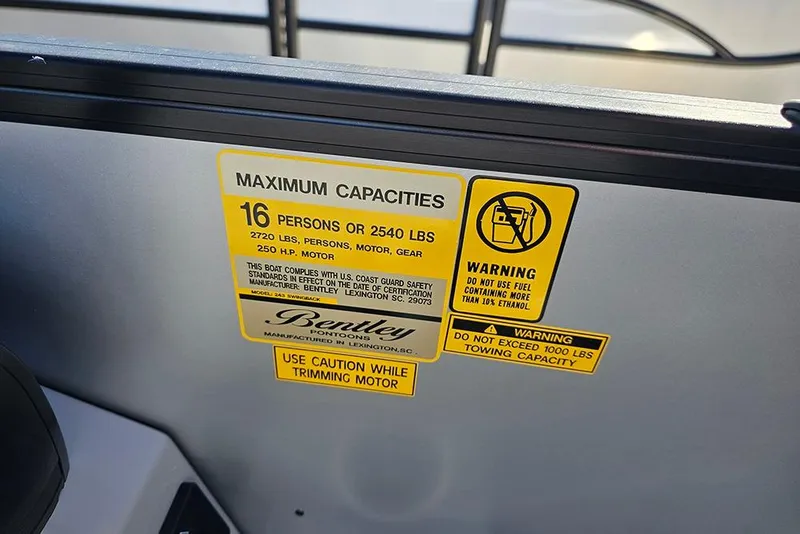 Slide: The Image of 2026 Bentley Pontoons Legacy 243 Swingback capacity warning labels, 16 persons or 2540 lbs. - 12