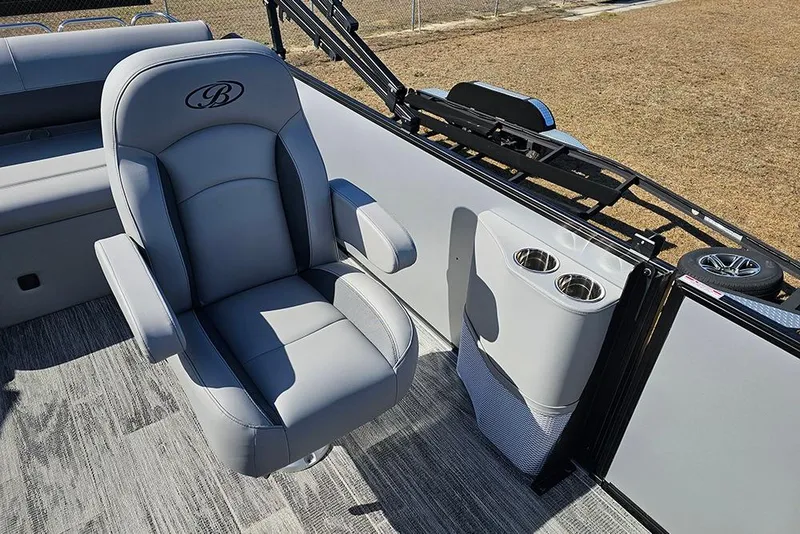 Slide: The Image of 2026 Bentley Pontoons Legacy 243 Swingback interior with plush seating and cup holders. - 13