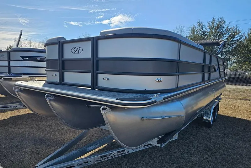 Slide: The Image of 2026 Bentley Pontoons Legacy 243 Swingback on trailer, outdoor display. - 3