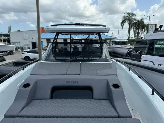 Slide: The Image of 2024 BRABUS Shadow 1000 ST luxury boat, docked with sleek design and modern features. - 15