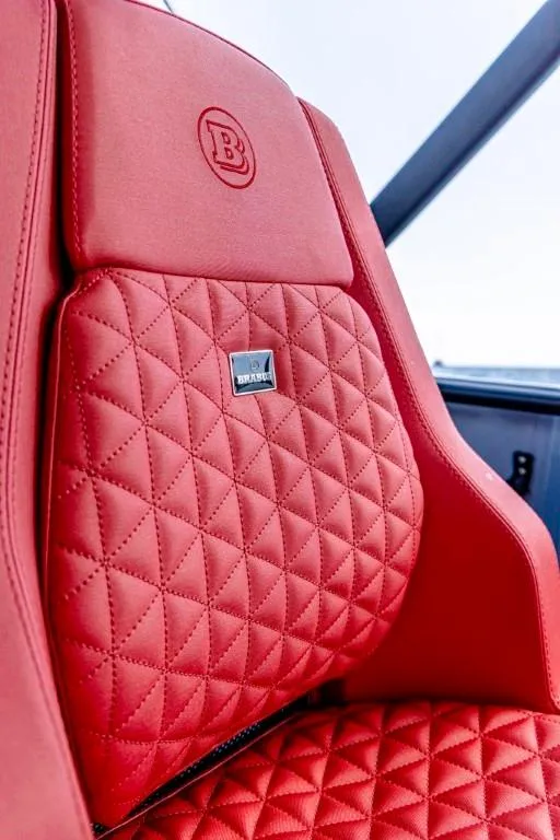 Slide: The Image of Red quilted seat of 2024 BRABUS SHADOW 300 CT with logo detailing. - 8