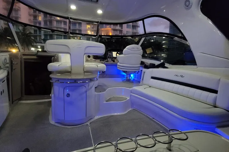 Slide: The Image of Luxurious interior of 2005 Sea Ray 500 Sundancer yacht with plush seating and ambient lighting. - 20