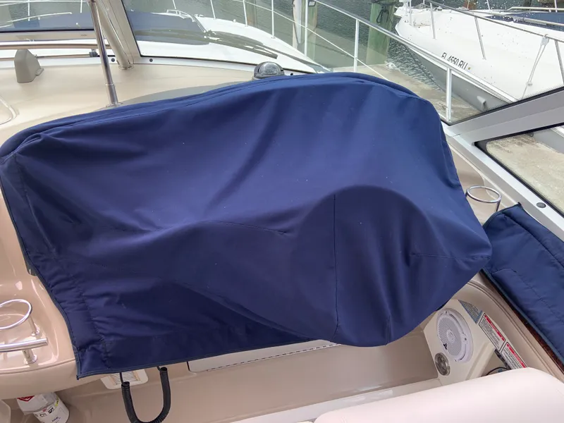 Slide: The Image of Covered helm station on a 2005 Sea Ray 500 Sundancer yacht. - 21
