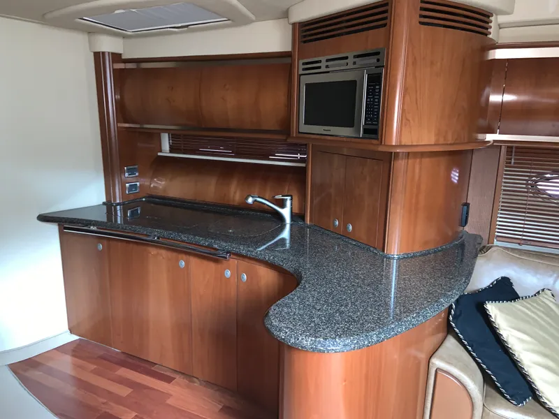Slide: The Image of Luxurious 2005 Sea Ray 500 Sundancer yacht interior with sleek kitchen design. - 39