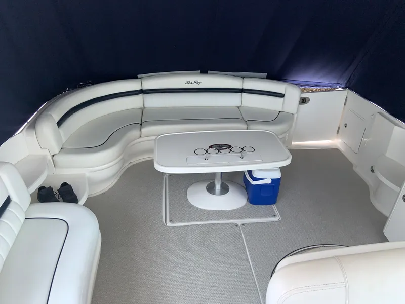 Slide: The Image of Luxurious interior of 2005 Sea Ray 500 Sundancer yacht with plush seating and table. - 5