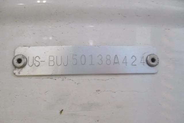 Slide: The Image of Metal identification plate on 2024 Tahoe T16 with serial number US-BUJ50138A424. - 11