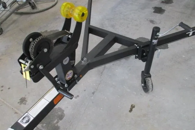 Slide: The Image of Trailer hitch and winch system of 2024 Tahoe T16 boat trailer. - 8