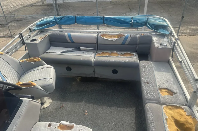 Slide: The Image of 1992 Sun Tracker Bass Buggy 18 Classic Series with worn, damaged seating and upholstery. - 5