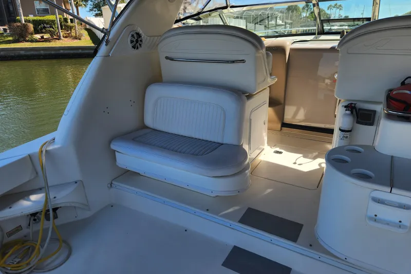 Slide: The Image of 2001 Sea Ray 340 Amberjack boat interior with seating and storage compartments. - 20