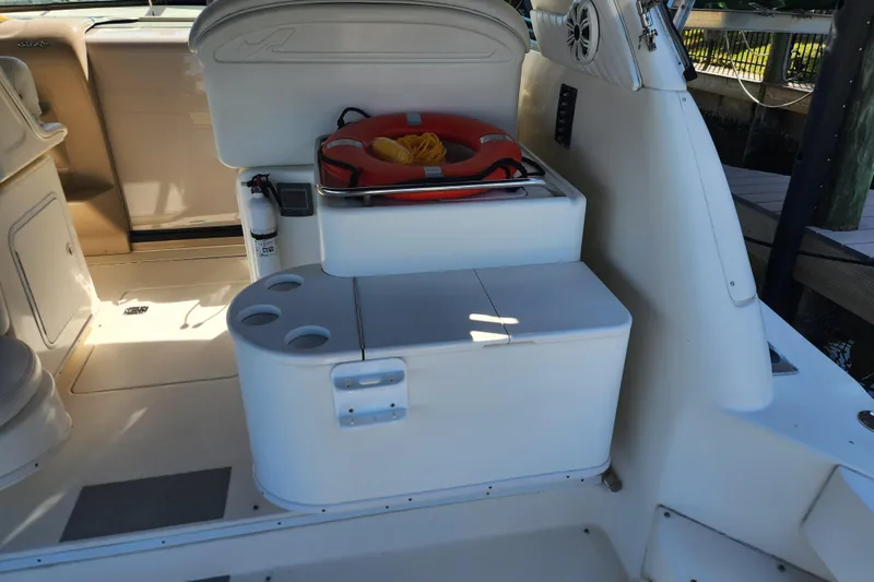 Slide: The Image of 2001 Sea Ray 340 Amberjack boat interior with seating and safety equipment. - 22