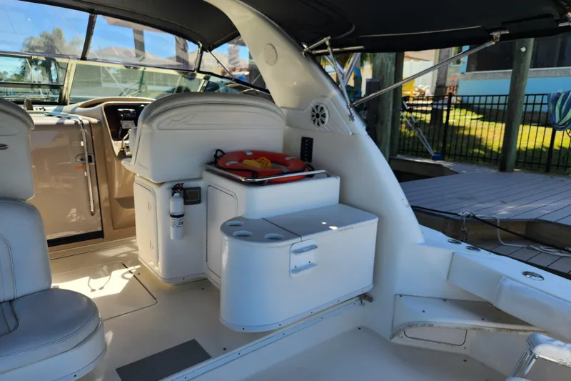 Slide: The Image of 2001 Sea Ray 340 Amberjack boat interior with seating and storage compartments. - 23