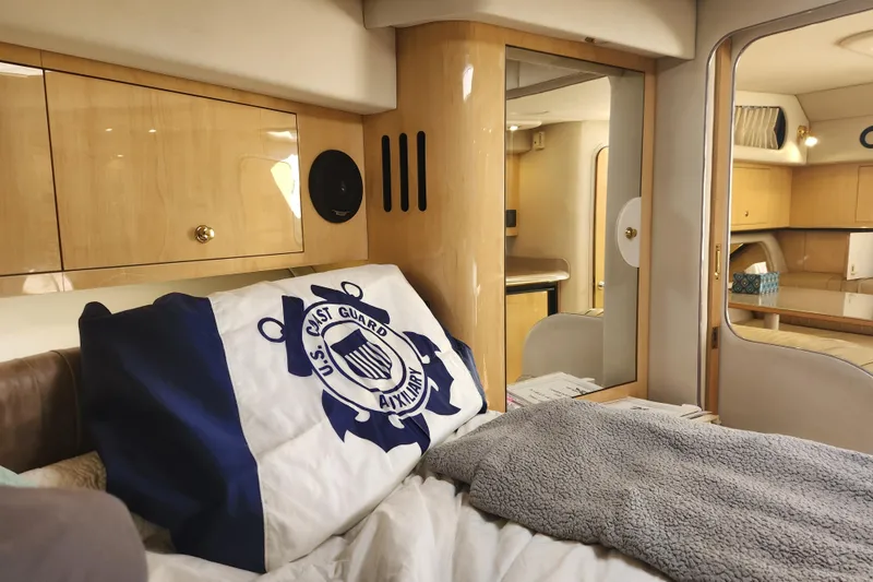 Slide: The Image of 2001 Sea Ray 340 Amberjack cabin interior with U.S. Coast Guard Auxiliary pillow. - 33