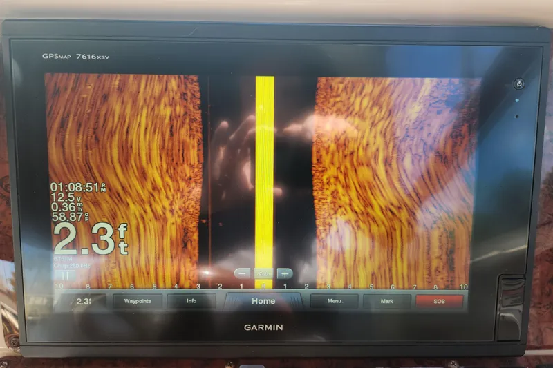 Slide: The Image of Garmin GPS display on 2001 Sea Ray 340 Amberjack showing sonar depth of 2.3 feet. - 43