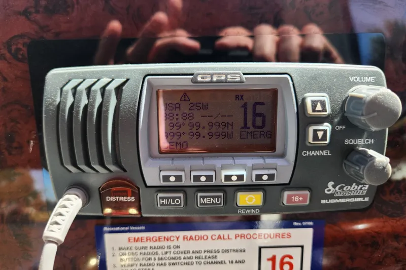Slide: The Image of Cobra Marine GPS radio on 2001 Sea Ray 340 Amberjack boat dashboard. - 46