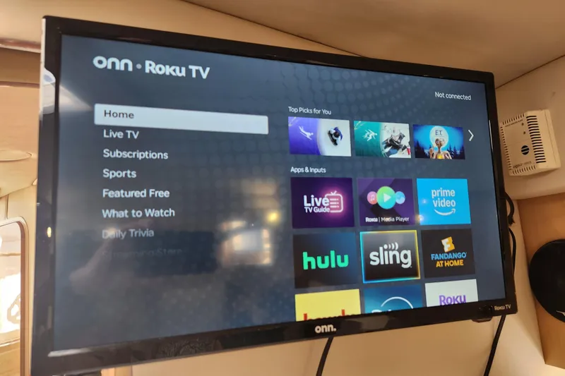 Slide: The Image of Onn Roku TV displaying streaming apps on a 2001 Sea Ray 340 Amberjack boat. - 47