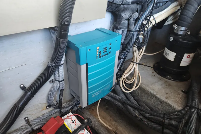 Slide: The Image of Engine room of 2001 Sea Ray 340 Amberjack with electrical components and wiring. - 49