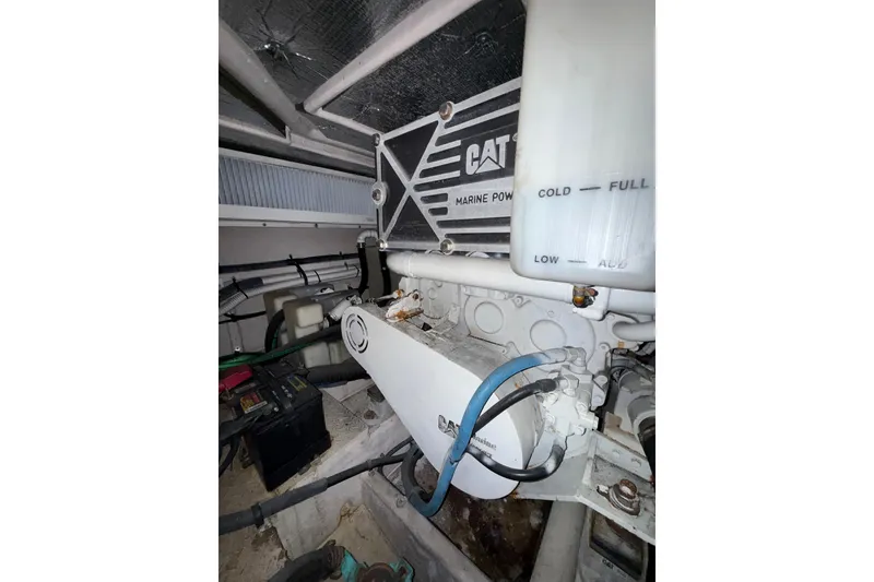 Slide: The Image of Engine room of 2001 Sea Ray 560 Sedan Bridge with Westerbeke generator. - 29