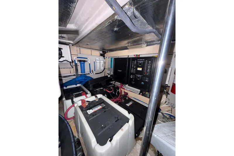 Slide: The Image of Engine room of 2001 Sea Ray 560 Sedan Bridge with CAT marine power components. - 45