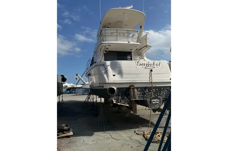 Slide: The Image of 2001 Sea Ray 560 Sedan Bridge yacht in dry dock. - 5