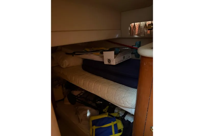 Slide: The Image of Bathroom interior of 2001 Sea Ray 560 Sedan Bridge yacht, featuring shower and toilet. - 50