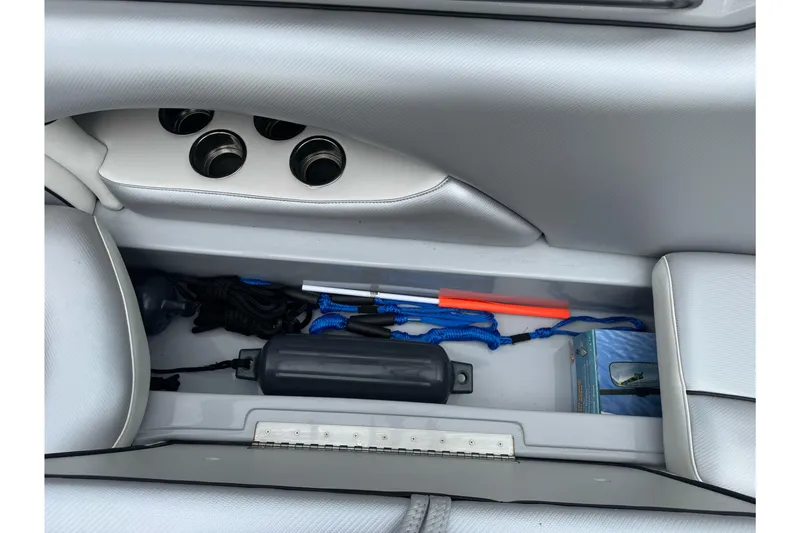 Slide: The Image of Storage compartment in 2024 Sanger 215 S boat with ropes and accessories. - 14