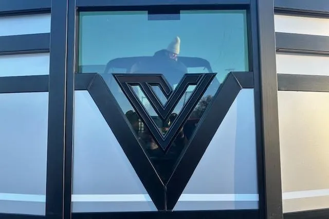 Slide: The Image of 2026 Viaggio Lago Z-B 22 logo on sleek, modern vehicle exterior. - 1