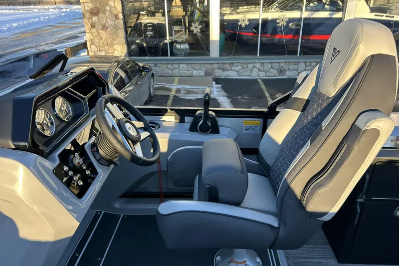 Slide: The Image of Viaggio Lago Z-B 22 boat cockpit, 2026 model, featuring modern steering and controls. - 12