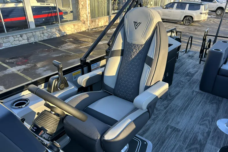 Slide: The Image of Captain's chair in 2026 Viaggio Lago Z-B 22 boat, featuring modern design and controls. - 13