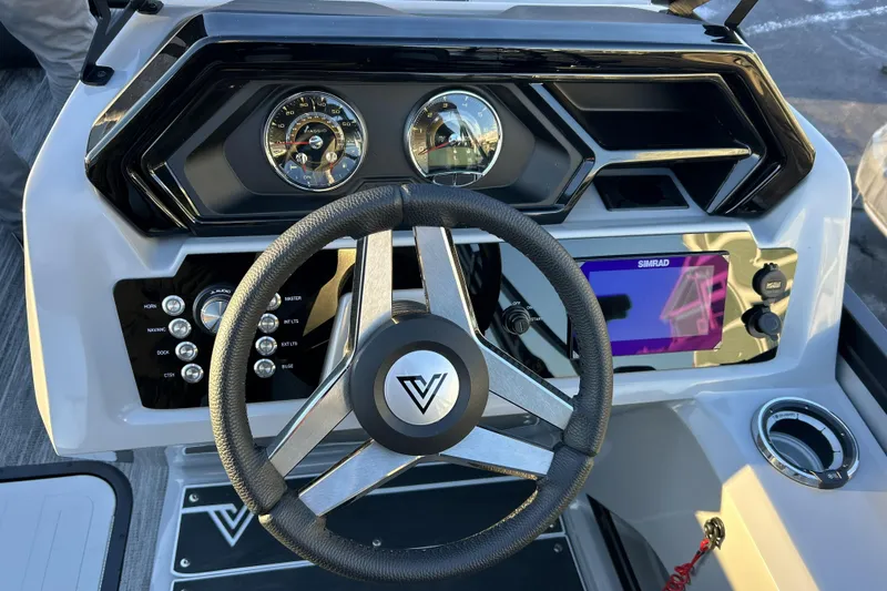 Slide: The Image of Steering console of 2026 Viaggio Lago Z-B 22 boat with modern controls and display. - 17
