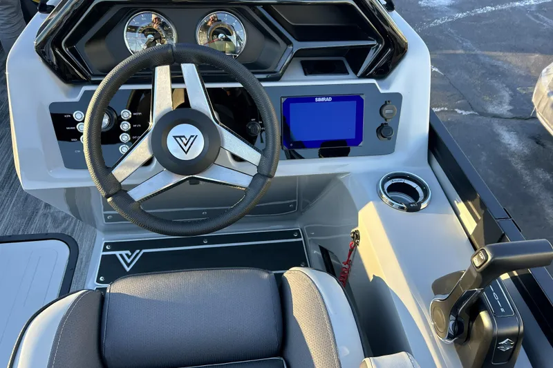 Slide: The Image of 2026 Viaggio Lago Z-B 22 boat dashboard with steering wheel and control panel. - 18
