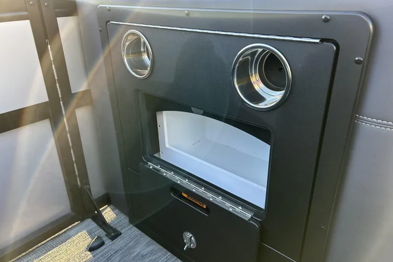 Slide: The Image of Interior of 2026 Viaggio Lago Z-B 22 boat with storage compartment and cup holders. - 24