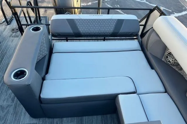 Slide: The Image of 2026 Viaggio Lago Z-B 22 boat interior with gray cushioned seating and cup holders. - 32