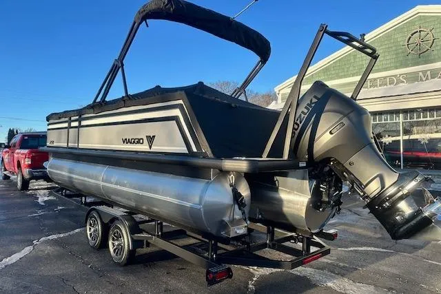 Slide: The Image of 2026 Viaggio Lago Z-B 22 pontoon boat on trailer, parked outdoors. - 39