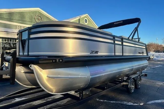 Slide: The Image of 2026 Viaggio Lago Z-B 22 pontoon boat on trailer in outdoor setting. - 4