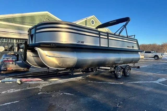 Slide: The Image of 2026 Viaggio Lago Z-B 22 pontoon boat on trailer in parking lot. - 5