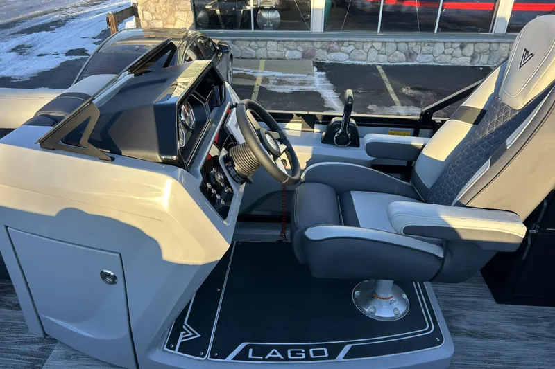 Slide: The Image of Captain's seat and helm of 2026 Viaggio Lago Z-B 22 boat, featuring modern controls and design. - 6