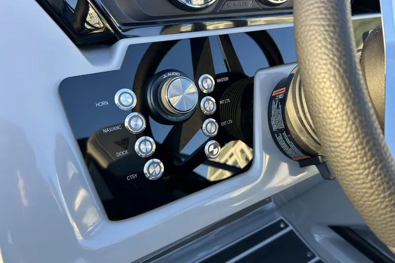 Slide: The Image of Control panel of 2026 Viaggio Lago Z-B 22 boat with audio and lighting buttons. - 8