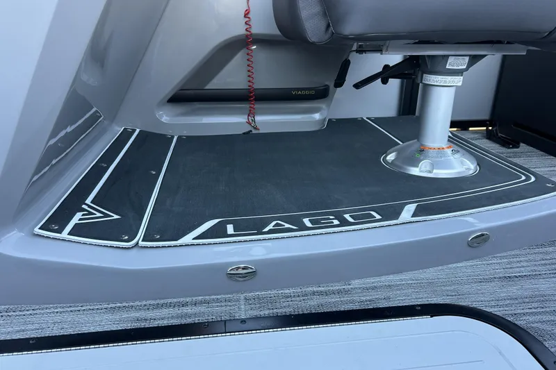 Slide: The Image of 2026 Viaggio Lago Z-B 22 boat interior with seating and branded flooring. - 9