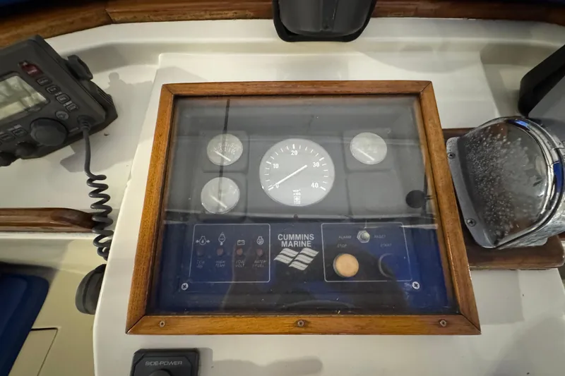 Slide: The Image of Control panel of a 1988 Blue Seas 31 boat with Cummins Marine gauges. - 24