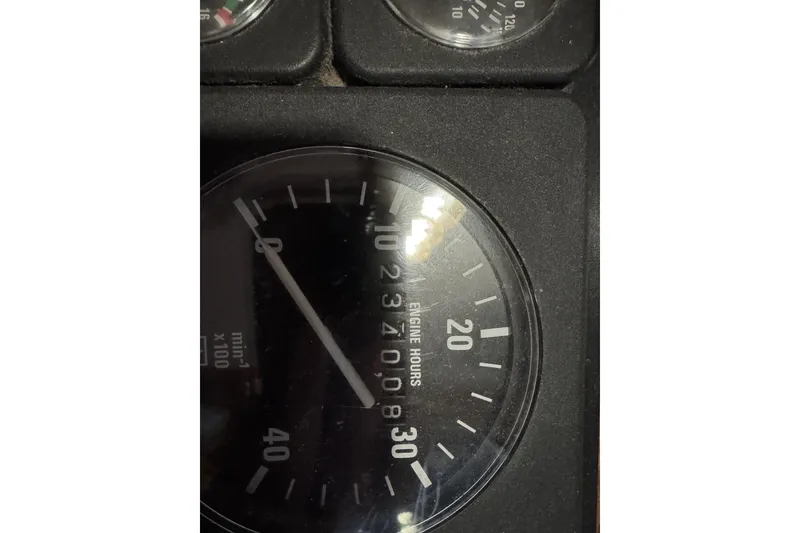 Slide: The Image of Close-up of a 1988 Blue Seas 31 engine hour meter, showing 2340 hours. - 29