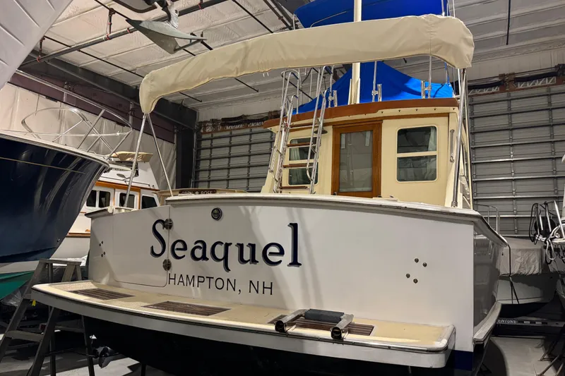 Slide: The Image of 1988 Blue Seas 31 boat named "Seaquel" in storage, Hampton, NH. - 3