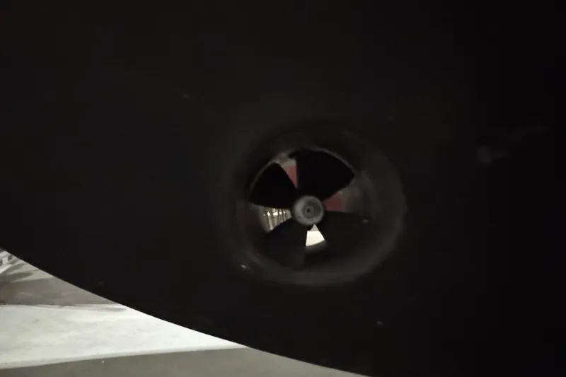 Slide: The Image of Close-up of a 1988 Blue Seas 31 boat's propeller in a dark setting. - 33